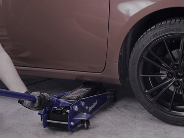 AlloyGator Installation Lower Vehicle with Tire Jack